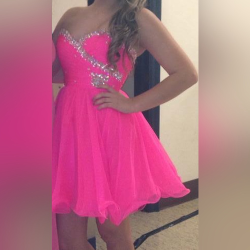 Bright pink size 6 short formal/homecoming dress with iridescent beading detail